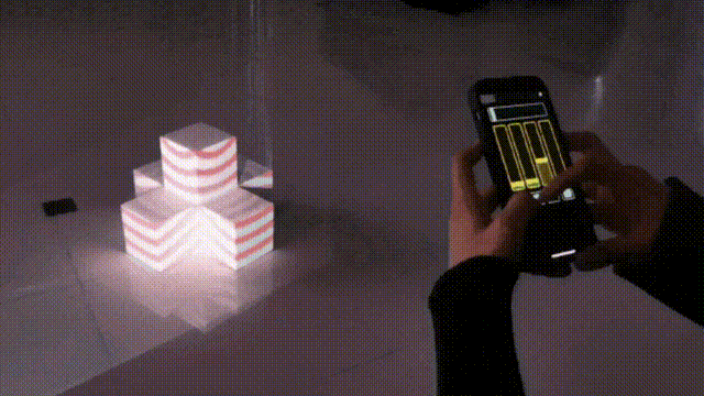 Remote control of interactive projection with touchpad or cell phone